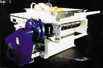 Re-Tech's RG72 rotary grinder combines the slow rpm of a shredder with the one-pass capability of a granulator.
