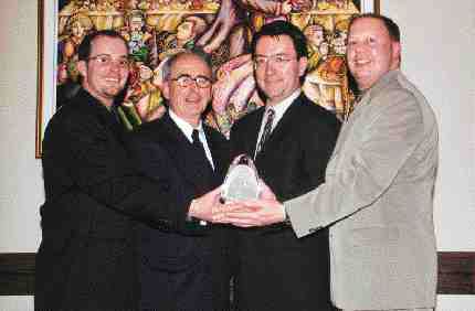 Injection molder IPL Inc. (St-Damien, Que.) was awarded CPIA Quebec's Prix d'excellence at the group's annual gala. Pictured left to right: Jean-Franois Lavoie, project manager, automotive; Julien Mtivier, president and CEO; Alain Ferland, president and COO; Michel Lanoue, director, R&D, industrial division.