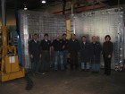 Mike Draga (left), Nicholas Roddy (third from left) and the Royal Mould build team with the two mold halves.