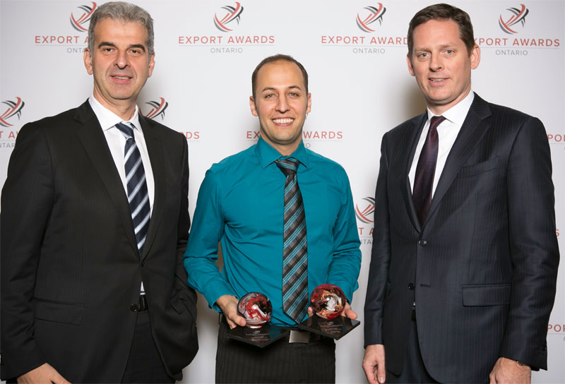 Dave Kroetsch, CEO and co-founder of Aeryon Labs Inc. (centre) with his two Ontario Export Awards, including the top award for Exporter of the Year. He is joined by (left) Frank Venturo, senior vice-president and country head of business banking with HSBC Canada, and (right) Daniel Leslie, senior vice-president and head of corporate banking for Canada at HSBC. HSBC was the platinum sponsor of the Ontario Export Awards.